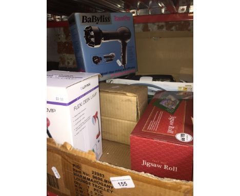 A box of boxed items to include Roberts portable radio, flexi desk lamp, jigsaw rolls, hair dryer, etc. 