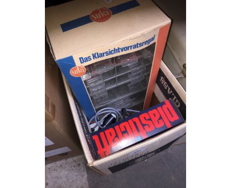 A multi-drawer cabinet, a AC lighting unit, Plasticraft re-meltable rubber. 