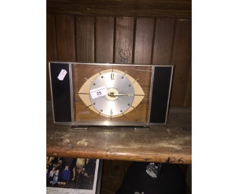 A vintage Metamec clock - in working order. 