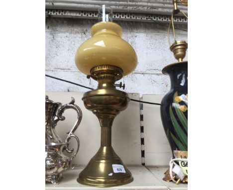 A Victorian brass paraffin lamp with glass funnel & duplex double wickCondition: no signs of any damage, all glass good.