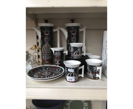 A quantity of Portmeirion tea/coffee wareCondition:- Crazing on every item apart from black plates, chips to rim on 2 cups wi