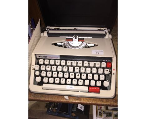 A Brother portable typewriter.Condition:- Includes instruction manual & typewriter layout diagram, with hard plastic cover, g