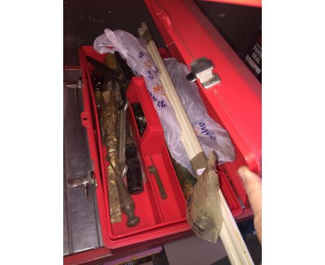 A toolbox with tools. 