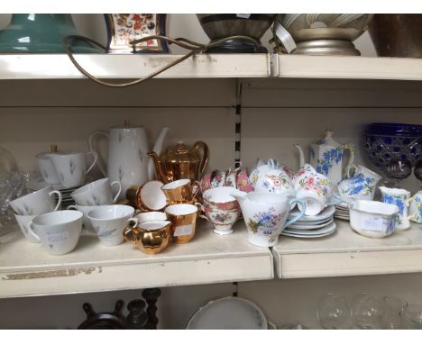 17 pieces of Shelley Wild Flowers teaware and four other part teasetsCondition: 3 Shelley cups with hairlines and chips,  2 h