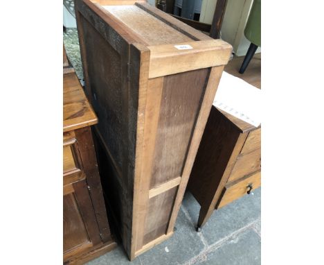 A lidded trunk on castors 