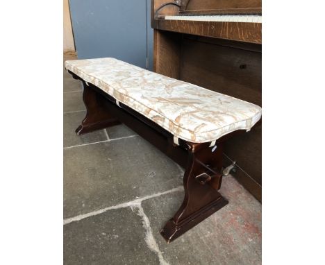A bench with cushion 