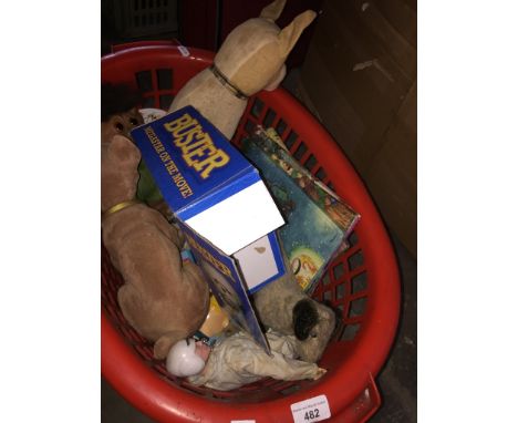 A basket of vintage toys to include a troll, nodding dogs, Danish stuffed dogs, Wade porridge bowls, boxed corgi and others, 