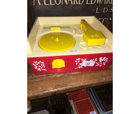 A vintage Fisher Price Music Box Record Player with discs. 