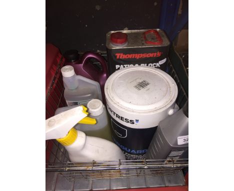 A wire basket containing various items to include engine oil, jewellery cleaner, patio cleaner, antifreeze, UPVC cleaner. 