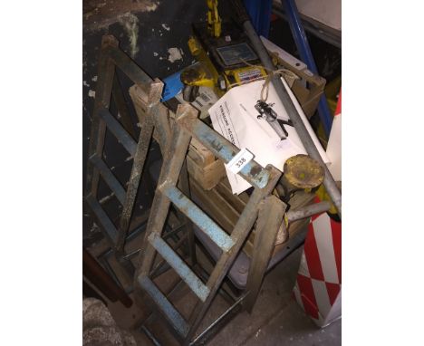 A box of axle stands, a box of garage items, a box of car mechanic tools, 2 car ramps and an hydraulic car jack 