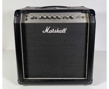 A Marshall SL5 guitar amplifier. Powers on and makes a sound. Also included is the original purchase receipt and repair recei