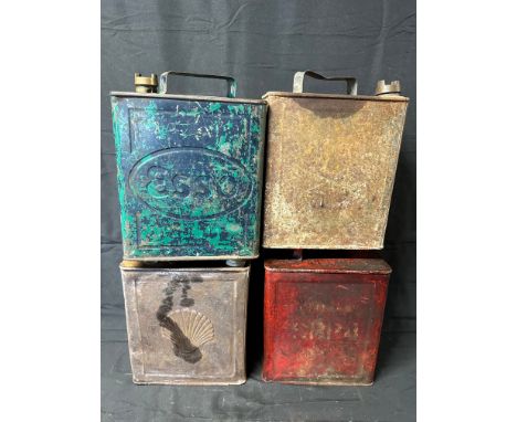 Four 2-gallon petrol cans: 1944 War Department with plain cap, Esso with Esso cap, Shell with Shell cap and a Shell-Mex &amp;