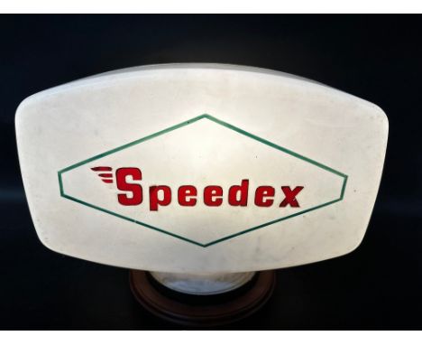 A plastic petrol pump globe branded with speedex stickers.