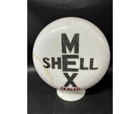 A Shell Mex Sealed pill-shaped glass petrol pump globe, stamped inside: Property of Shell-Mex Ltd. Returnable on demand, has 