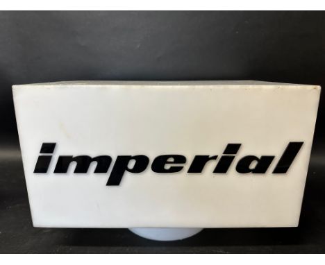 An Imperial ICI plastic petrol pump globe of rectangular form.