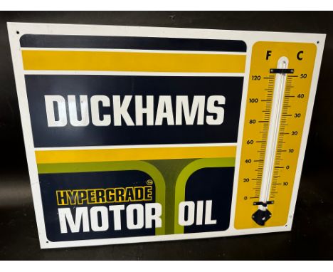 A Duckhams Hypergrade Motor Oil garage enamel advertising thermometer sign, 26 1/4 x 20".
