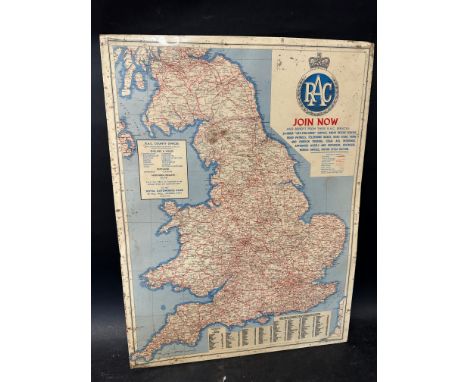 An RAC salesman's cellulose covered advertising sign with detailed UK map and distances in miles from Leeds, produced by John