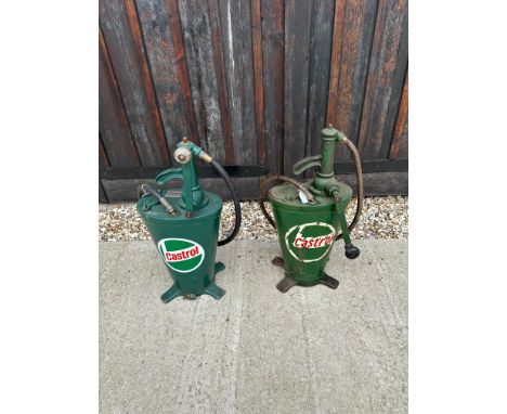 Two forecourt oil dispensers with Castrol decals. 