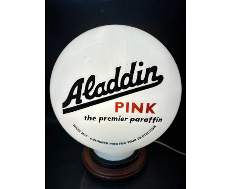 An Aladdin Pink 'the premier paraffin' - "White May" colour pink for your protection, glass pill-shaped petrol pump globe by 