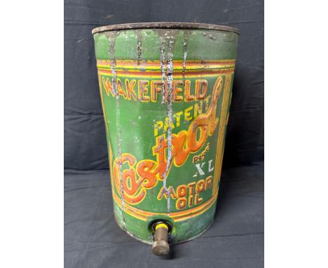 A Wakefield Castrol Motor Oil XL five gallon can with dispensing tap. 