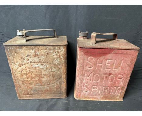 A Shell Motor Spirit two gallon can and an Esso similar, both Valor and with matching caps.