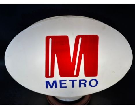 A Metro plastic oval petrol pump globe.
