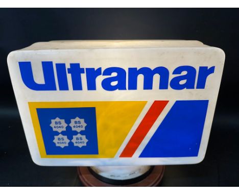 An Ultramar plastic petrol pump globe, small hole to one corner.