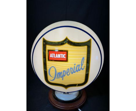 An Atlantic Imperial glass petrol pump globe, nibbles to base, see pics. (American).