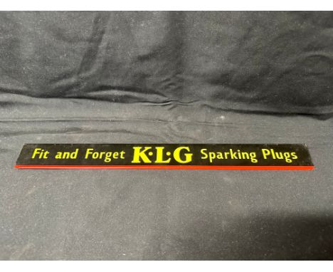 A K.L.G 'Fit and Forget' Sparking Plugs advertising shelf strip sign, 15 1/2".