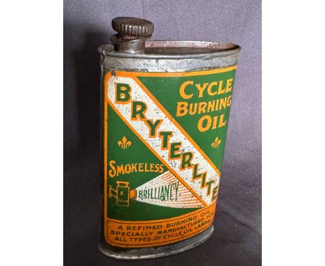 A Bryterlite Cycle Burning Oil tin with lighting table for cycles and vehicles in Greenwich time to the back.
