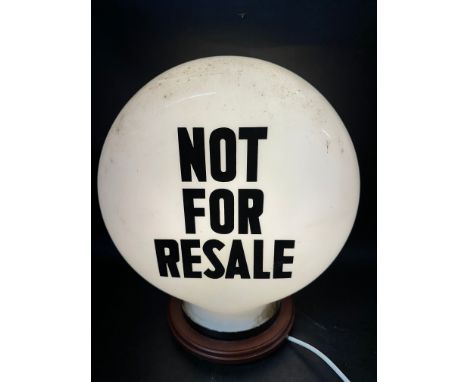 A Not For Resale pill-shaped glass petrol pump globe by Hailware, minor nibbles to neck.
