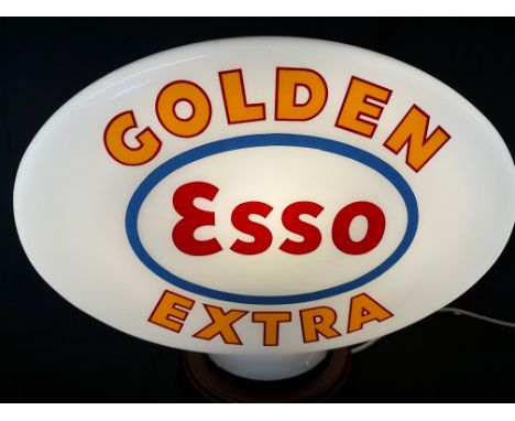 An Esso Golden Extra glass petrol pump globe by Hailware, stamped Property of Esso Petroleum Ltd to inner neck, insignificant