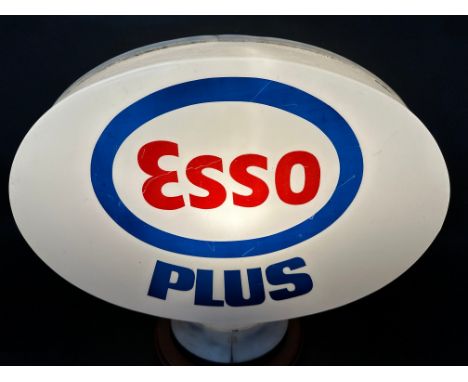 An Esso Plus plastic petrol pump globe, some fading.