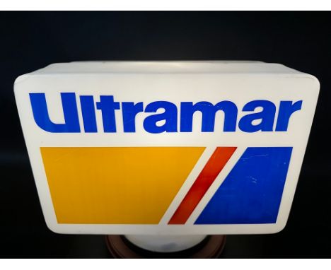 An Ultramar plastic petrol pump globe, damage to one corner.