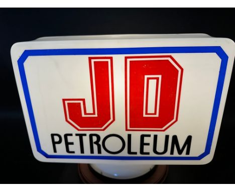 A JD Petroleum plastic petrol pump globe. 