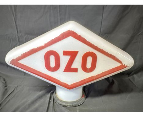 An OZO lozenge-shaped glass petrol pump globe, lettering rubbed, old rubber ring around neck securely in place, no apparent d