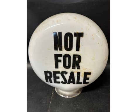 A heavy and early 'Not For Resale' pill-shaped glass petrol pump globe, numbered 5 to inside neck and stamped Property of She