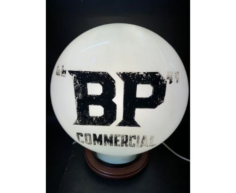 A rare BP Commercial pill shaped glass petrol pump globe in good original condition, fading to verso.