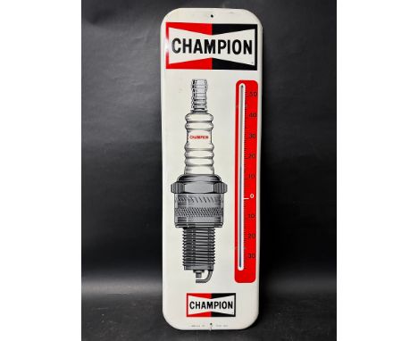 A Champion Spark Plug garage advertising thermometer, 11 3/4 x 38".