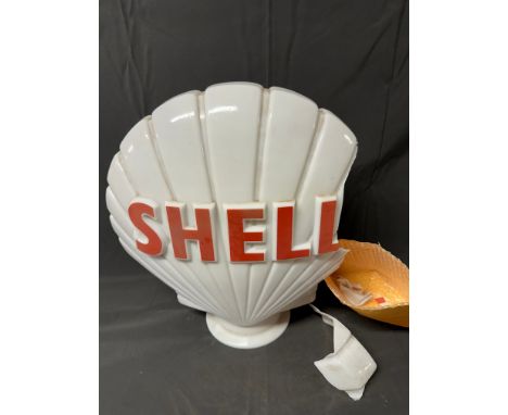 A Shell glass petrol pump globe by Webb's Crystal Glass Co. Ltd., with significant damage. Bag of glass pieces present (unsur