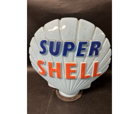 A Super Shell (blue) glass petrol pump globe stamped Property of Shell-Mex &amp; B.P Ltd,  to inside and numbered to front ou