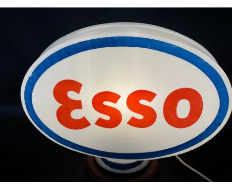 An Esso plastic petrol pump globe. 
