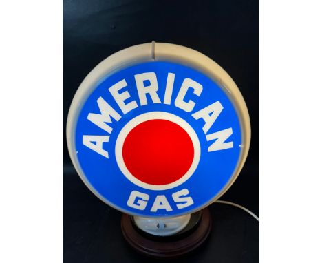 An American Gas plastic globe, reproduction.
