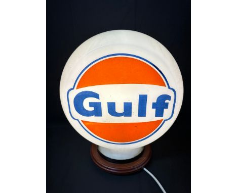 A Gulf branded pill-shaped glass petrol pump globe by Hailware, one small blemish to neck and minor nibble to rim, see pics.