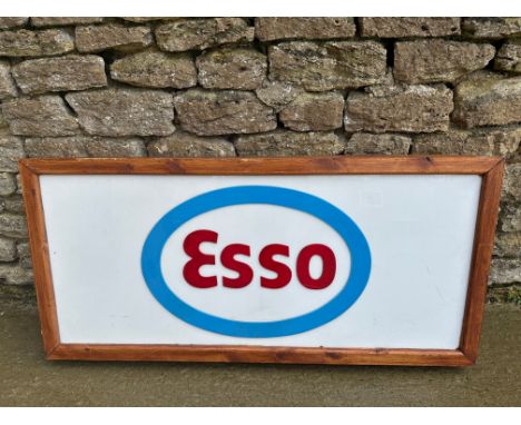 A contemporary hanging lightbox garage sign advertising Esso, 49 3/4 x 23 1/2 x 5 3/4".