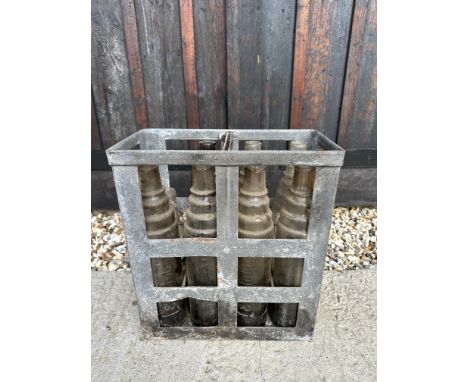 Seven Essolube quart oil bottles and a Castrol pint in Essolube crate. 