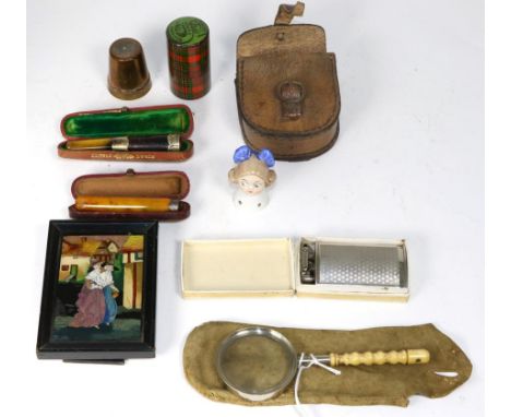 Assorted collectables to include cheroot holders; pockets compass; magnifying glass with Stanhope handle of Ilkley; tartan wa