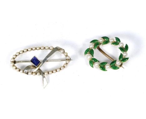 A green enamel and seed pearl laurel wreath brooch, measures 2cm by 2.5cm and a sapphire and seed pearl brooch (2).  6.3g gro