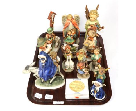 A group of Hummel figures 