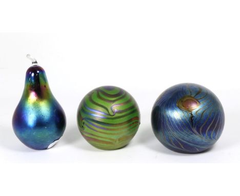 John Ditchfield for Glasform; an iridescent green paperweight decorated with bands, etched to base J. Ditchfield GLASFORM and